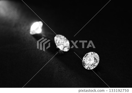 Three diamonds are on a black background Three diamonds are on a black background 133192750