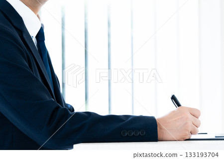 businessman with pen businessman with pen 133193704
