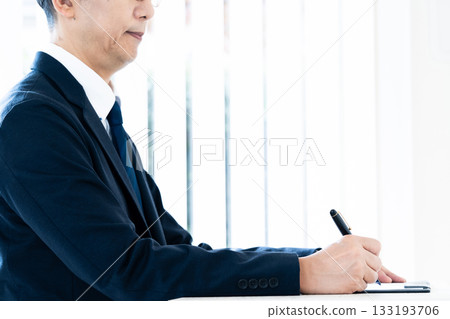 businessman with pen businessman with pen 133193706