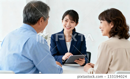 A middle-aged couple discussing life plans and insurance 133194024