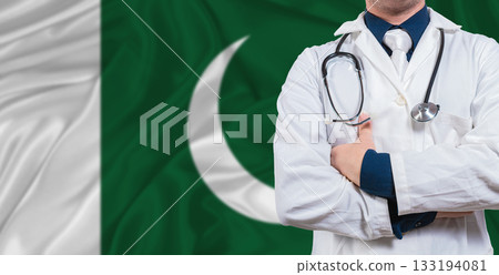 Male doctor with stethoscope on Pakistan flag. Doctor holding stethoscope on Pakistan flag Male doctor with stethoscope on Pakistan flag. Doctor holding stethoscope on Pakistan flag 133194081