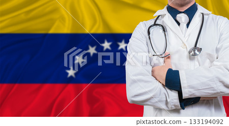 Male doctor with stethoscope on Venezuela flag. Doctor holding stethoscope on Venezuela flag 133194092