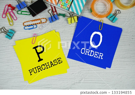 PO - Purchase Order text on stick note with stationery on concrete background PO - Purchase Order text on stick note with stationery on concrete background 133194855