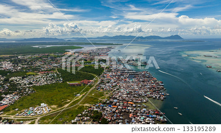 Aerial view of cityscape of the town of Semporna. Borneo, Sabah, Malaysia. Aerial view of cityscape of the town of Semporna. Borneo, Sabah, Malaysia. 133195289