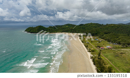 Top view of tropical landscape with a beautiful beach. Kimihang beach. Borneo, Sabah, Malaysia. Top view of tropical landscape with a beautiful beach. Kimihang beach. Borneo, Sabah, Malaysia. 133195318