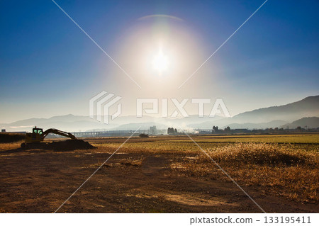 Rural scenery shining in the morning mist Rural scenery shining in the morning mist 133195411