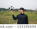 Smiling portrait of a soccer player 133195694