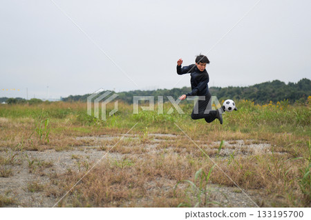 Man practicing soccer heel lifts Man practicing soccer heel lifts 133195700