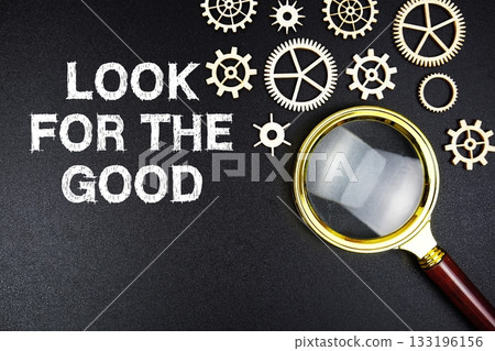 Look For The Good text message with magnifying glass on black background Look For The Good text message with magnifying glass on black background 133196156