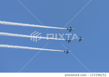 Blue Impulse flying in the blue sky 133196252