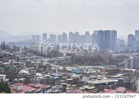 Smog and yellow dust pollution covering cityscape of Seoul capital of South Korea 133197047