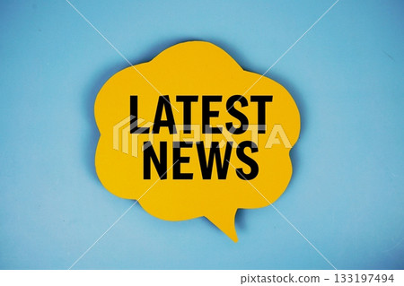 Latest News text with speech bubble top view on blue background 133197494