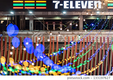 Night view of a 7-Eleven store with colorful string lights in Hangang river park in Seoul, South Korea 133197627