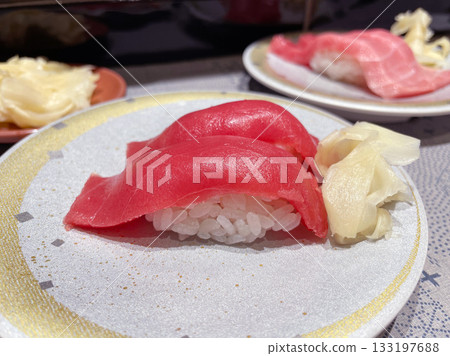 Bluefin tuna lean meat nigiri sushi: A classic tuna nigiri bursting with flavor. Bluefin tuna lean meat nigiri sushi: A classic tuna nigiri bursting with flavor. 133197688