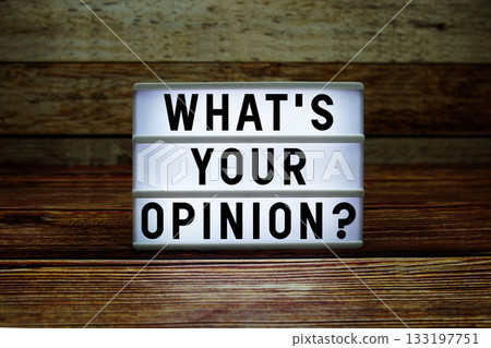 Lightbox with text "What's Your Opinion?" on wooden background Lightbox with text "What's Your Opinion?" on wooden background 133197751