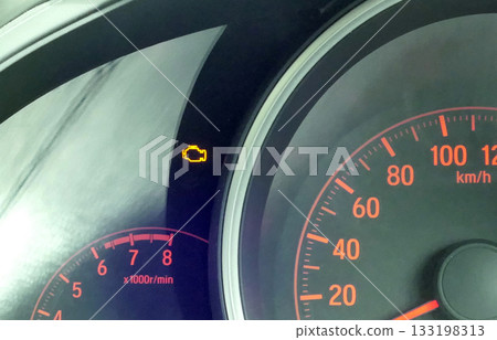 Check engine light. Car dashboard in closeup 133198313