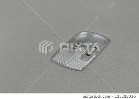 Light at roof in modern car with switch of lamp 133198330