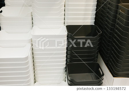White and black stacked storage bins for home and office organization White and black stacked storage bins for home and office organization 133198572