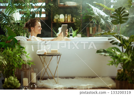 Luxurious Bathing with Tablet in a Home Oasis 133200319