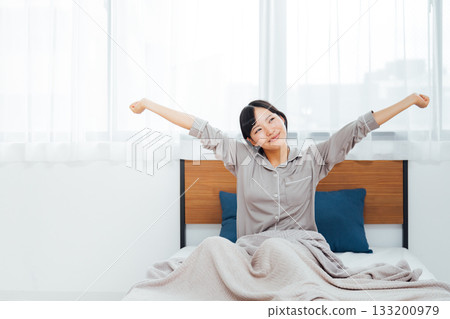The life of a young woman who is conscious of well-being A woman who slept well The life of a young woman who is conscious of well-being A woman who slept well 133200979