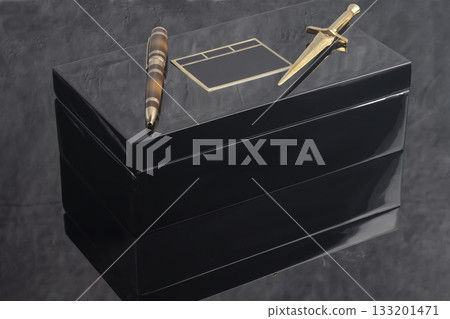 Fountain pen on a gray marble background. Boxed and unboxed. Selective focus. Fountain pen on a gray marble background. Boxed and unboxed. Selective focus. 133201471