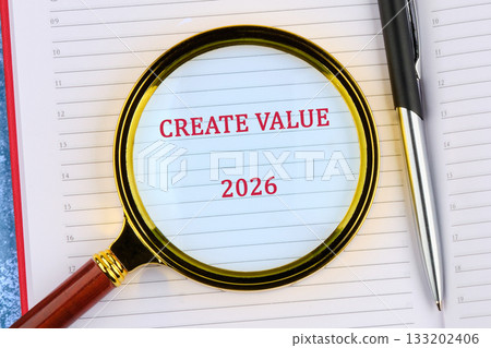 A close-up showing an agenda with the words CREATE VALUE and 2026 emphasized under a magnifying glass, with a pen resting nearby, symbolizing future planning A close-up showing an agenda with the words CREATE VALUE and 2026 emphasized under a magnifying glass, with a pen resting nearby, symbolizing future planning 133202406