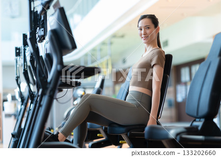 A young woman training at a sports gym. Photo courtesy of Sports Club & Sauna Spa Renaissance Makuhari 24 A young woman training at a sports gym. Photo courtesy of Sports Club & Sauna Spa Renaissance Makuhari 24 133202660