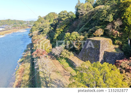 Aerial view of the ruins of Hitoyoshi Castle and the Kuma River in Hitoyoshi, Kumamoto 133202877
