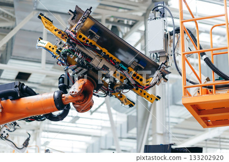 Automotive production line. Robotic Welding car body. Modern car Assembly plant Automotive production line. Robotic Welding car body. Modern car Assembly plant 133202920