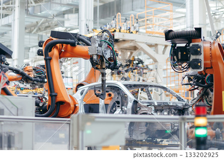 Automotive production line. Robotic Welding car body. Modern car Assembly plant Automotive production line. Robotic Welding car body. Modern car Assembly plant 133202925