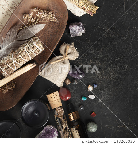 Rustic Aromatherapy and Healing Crystal Arrangement on Dark Background Rustic Aromatherapy and Healing Crystal Arrangement on Dark Background 133203039