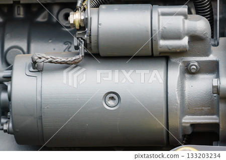 Diesel engine close up, starter detail Diesel engine close up, starter detail 133203234