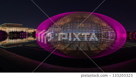 National Centre for the Performing Arts NCPA reflecting in the water at night in Beijing, China 133203323