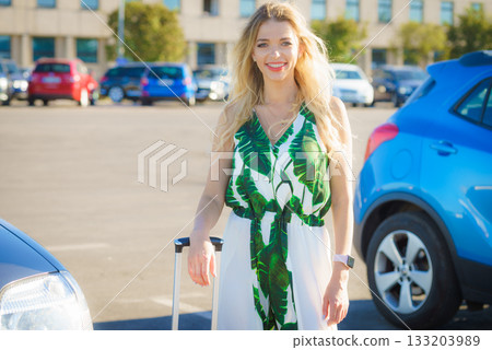 Fashion model arriving at airport Fashion model arriving at airport 133203989