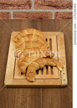 Freshly baked croissants Freshly baked croissants 133204369