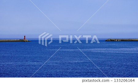 The lighthouse of Izuhara Port and the sea of Tsushima seen from Ferry Kizuna The lighthouse of Izuhara Port and the sea of Tsushima seen from Ferry Kizuna 133206164