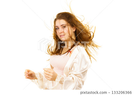 Brunette girl with blowing hair Brunette girl with blowing hair 133206366