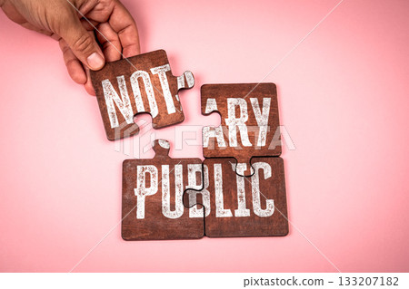 Hand Assembling Wooden Puzzle Pieces with Text Notary Public Representing Legal Certification and Hand Assembling Wooden Puzzle Pieces with Text Notary Public Representing Legal Certification and 133207182