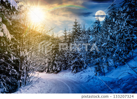 winter mountain landscape. day and night time change concept. curve of country road that leads into the coniferous forest covered with snow with sun and moon at twilight. equality and shift template 133207324