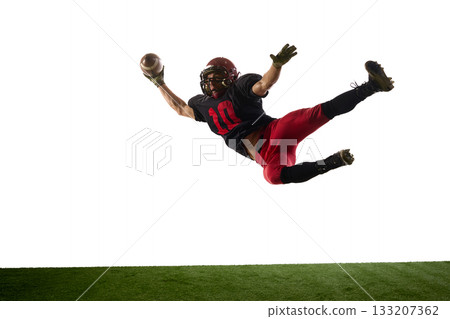 American football player diving horizontally with energetic emotion isolated on white background American football player diving horizontally with energetic emotion isolated on white background 133207362