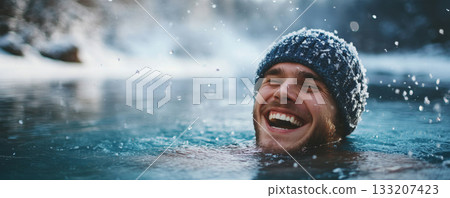 Man smiling while swimming in freezing winter lake 133207423