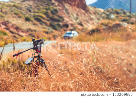Camera taking picture film on nature 133209693
