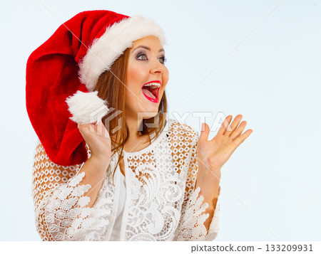 Shocked santa claus christmas woman Shocked santa claus christmas woman 133209931