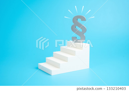 A symbol of law and order at the top of the stairs. Rule of law. Justice. Legal clarity, structural hierarchy, societal stability, and public governance. Policy reform 133210403