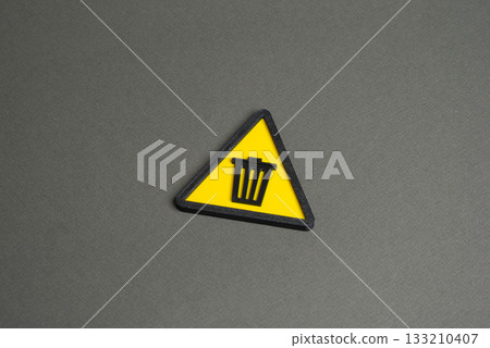 Garbage and waste, a symbol of attention. Waste disposal. Environmental awareness and sustainable living. Recycling and proper waste management. 133210407