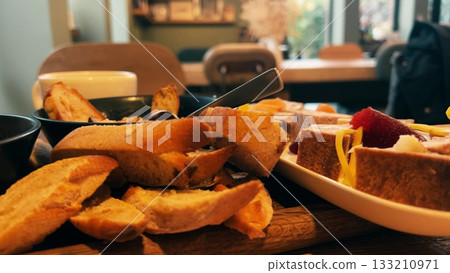 Fine dining French restaurant starters with grilled bread and appetizers 133210971