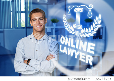 Young lawyer stands confidently in modern office promoting online legal services 133211783
