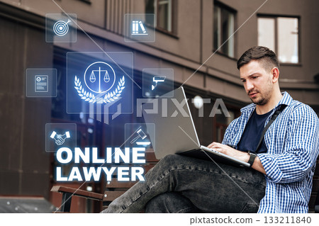 Working online as a lawyer with digital tools in a modern city setting Working online as a lawyer with digital tools in a modern city setting 133211840
