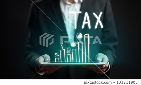 Tax data analysis shown through charts and graphs in a business setting 133211903