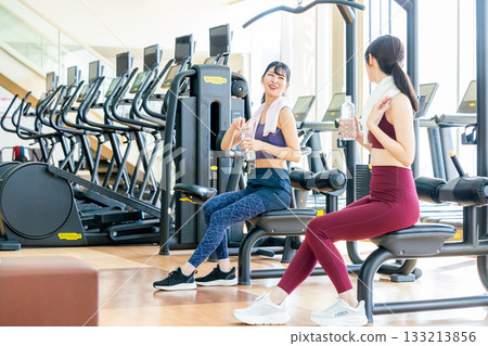 Young woman resting at the gym Young woman resting at the gym 133213856